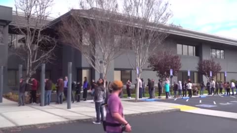 People line up outside Silicon Valley Bank in Santa Clara, California, after its collapse