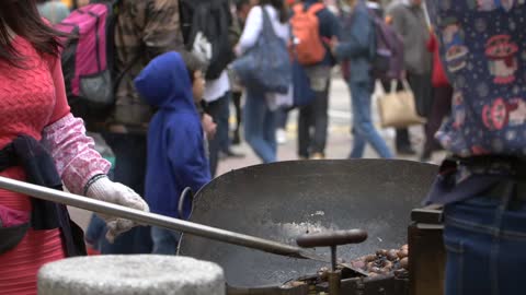 Cooking Chestnuts at Street Stall