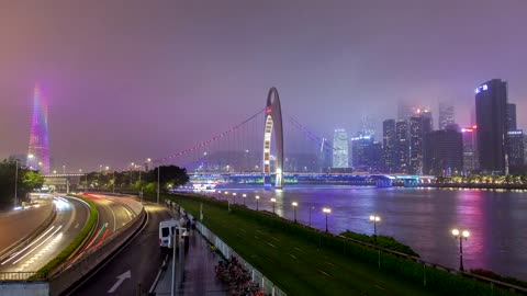 Guangzhou illuminated cityscape with cloudy sky