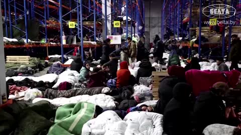 Belarus moves migrants to giant warehouse