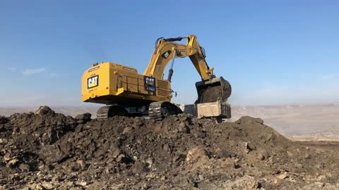 Caterpillar 6015B Excavator Loading Trucks With Two Passes - Sotiriadis Mining Works