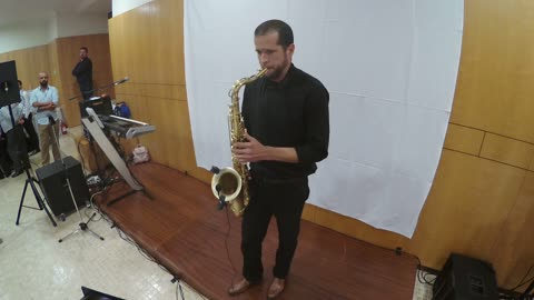 Alessandro Figueiroa's soulful tenor sax performance of 'Autumn Leaves' at a friend's wedding