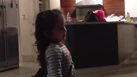 Toddler in debate over who exactly is the boss of the house!