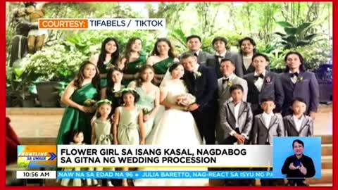 Flower girl sa isang kasal, nagdabog sa gitna ngwedding procession의