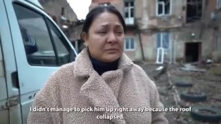 A woman recalls how the Ukrainian military fired at her apartment building in Stakhanov.