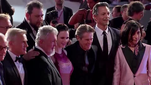 Waltz, Dafoe attend Venice premiere of 'Dead for a Dollar'