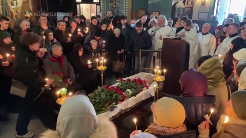 Scenes inside Moscow church during farewell ceremony for opposition leader Navalny