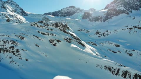 A few snowflakes on a snow mountain