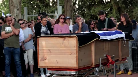 Israeli festival survivor attends friends' funerals