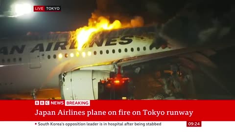 Japan Airlines plane in flames on the runway at Tokyo's Haneda Airport -BBC News