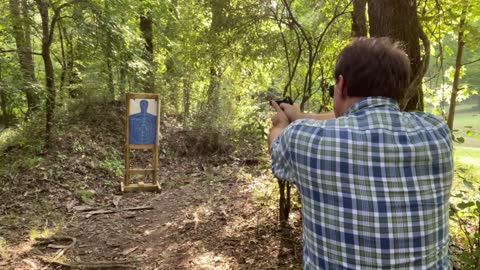 Demonstrating Beretta M9 9mm on Home made Target Stand
