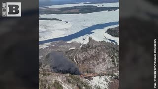 WATCH: Aerial View of Train Derailment and Fire by Lake in Maine