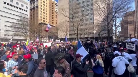 Crowd gathers outside the Manhattan courthouse in support of President Trump