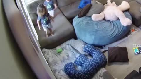 Toddler Pushes His Brother Off The Couch And Jumps Over Him