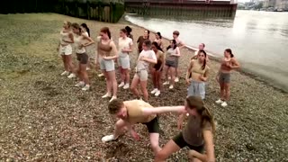 Ballet dancers perform by River Thames to spread climate hope