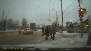 Pedestrian Crossing Street Struck by Passing Car