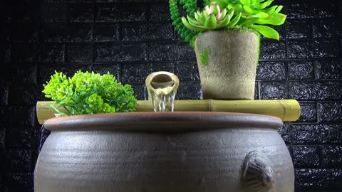 My father shares tips to make waterfall aquarium from bamboo