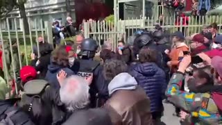 French protesters storm a medical centre which is being visited by the health minister.