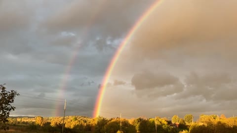 Video of the Complete Arc of a Double Rainbow Showing Both Ends of Both Arcs