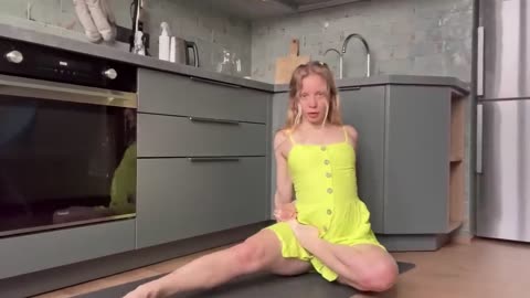 Home Workout and Stretching in a dress
