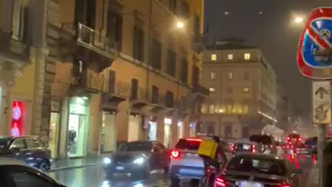 On a rainy street in Rome