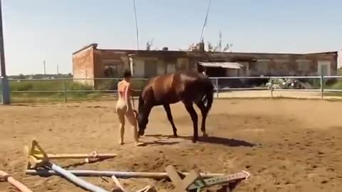 Girl Keeps Trying To Climb A Tall Horse. Now Watch What The Considerate Animal Does To Help