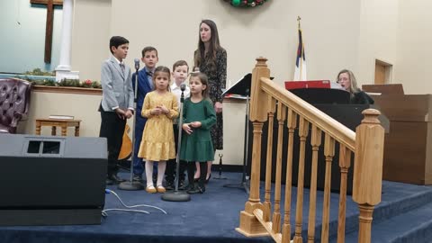 Grandkids Singing in Church