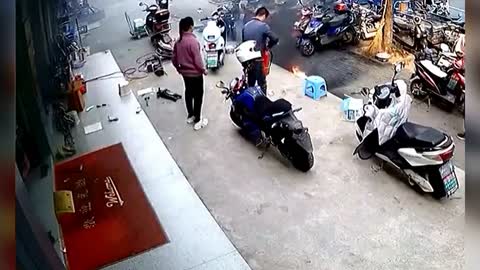 Lithium battery bursts into flames after customer removes it from scooter in China