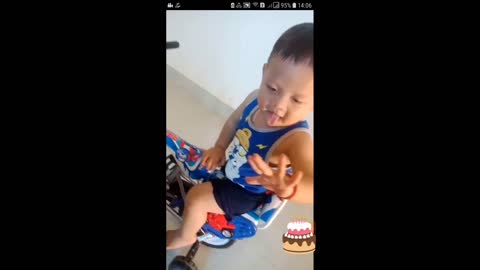 Clip of baby practicing to ride a bicycle