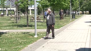 Older Turks enjoy walks outside as coronavirus rules relaxed