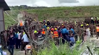 Rescuers gather at site of fatal Nepal plane crash