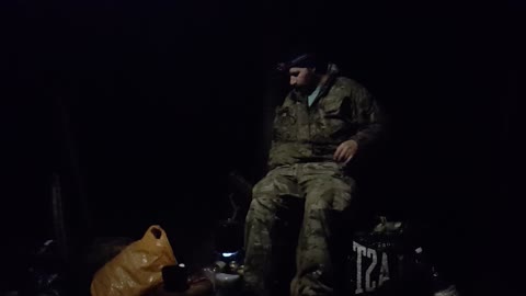 Using the MSR pocket rocket to make a coffee in a woodland at night.