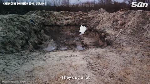 Ukraine officials survey Russian dug trenches in Chernobyl exclusion zone's radioactivity levels