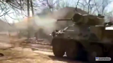 BTR and MBT operated by the 4th Rapid Reaction Brigade engaging with Russian forces in Rubizhne city