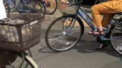 Japanese riding bicycles