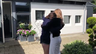 Woman surprises friends and family after year abroad