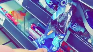 Cashier Restocks Freezer With Melted Ice Creams