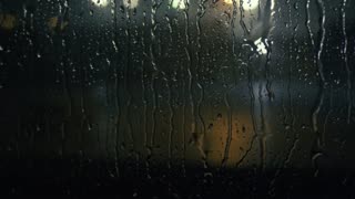 RAIN OUTSIDE WINDOWS BEFORE NIGHT SLEEP