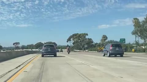 Motorcycle Fails To Wheelie On Freeway