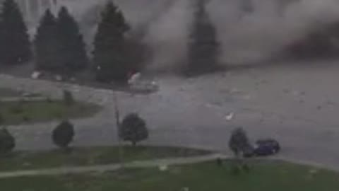 Massive Explosion Of A Building As Cars Pass By