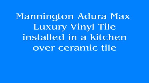 Mannington Adura Luxury Vinyl Plank installed over an existing ceramic tile floor in a kitchen.