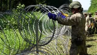 Lithuania builds Belarus border fence to bar migrants