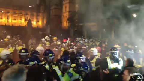 Clashes between police and the 'Million Mask March' protesters in Parliament Square, London
