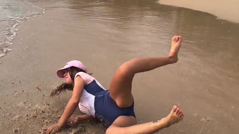 Girl fails on surf