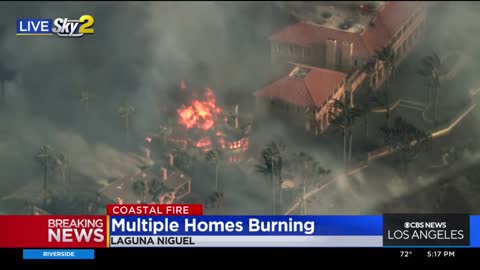 Homes up in flames as massive fire sweeps across Laguna Hills in Orange County CA
