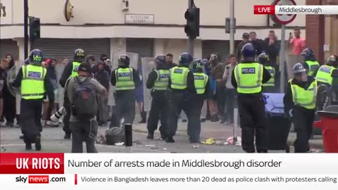 UK riots_ Wheelie bins on fire launched at police in Middlesbrough
