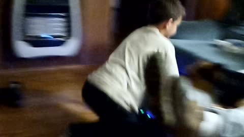 Grandson safely riding hoverboard
