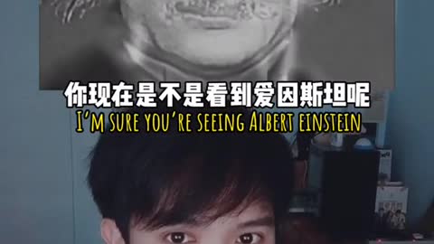 Who do you see in the photo? Albert Einstein?