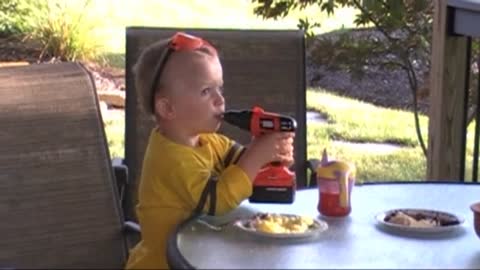 Baby Handyman Licks Frosting Off Moving Powerdrill