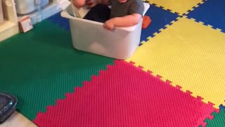 Toddlers Get Stuck In Plastic Bin Together